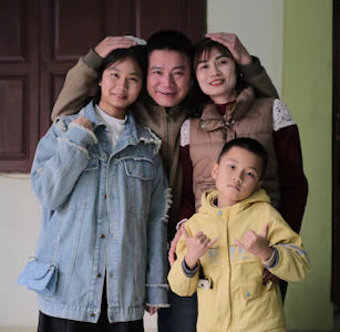 A group of people standing next to each other