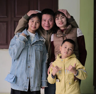 A group of people standing next to each other