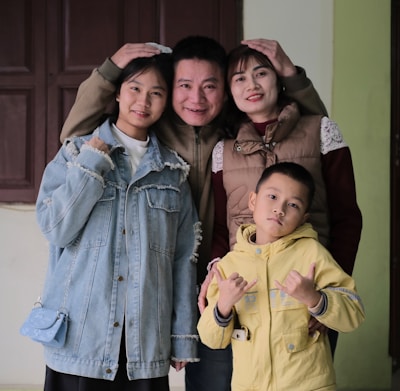 A group of people standing next to each other