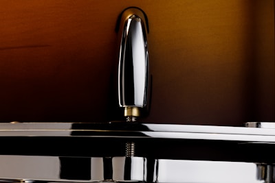 Polished chrome faucet with crystal clear water