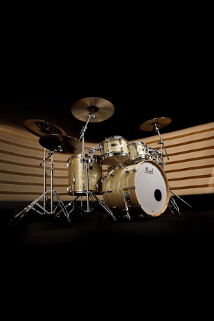 A drum set is shown in the dark