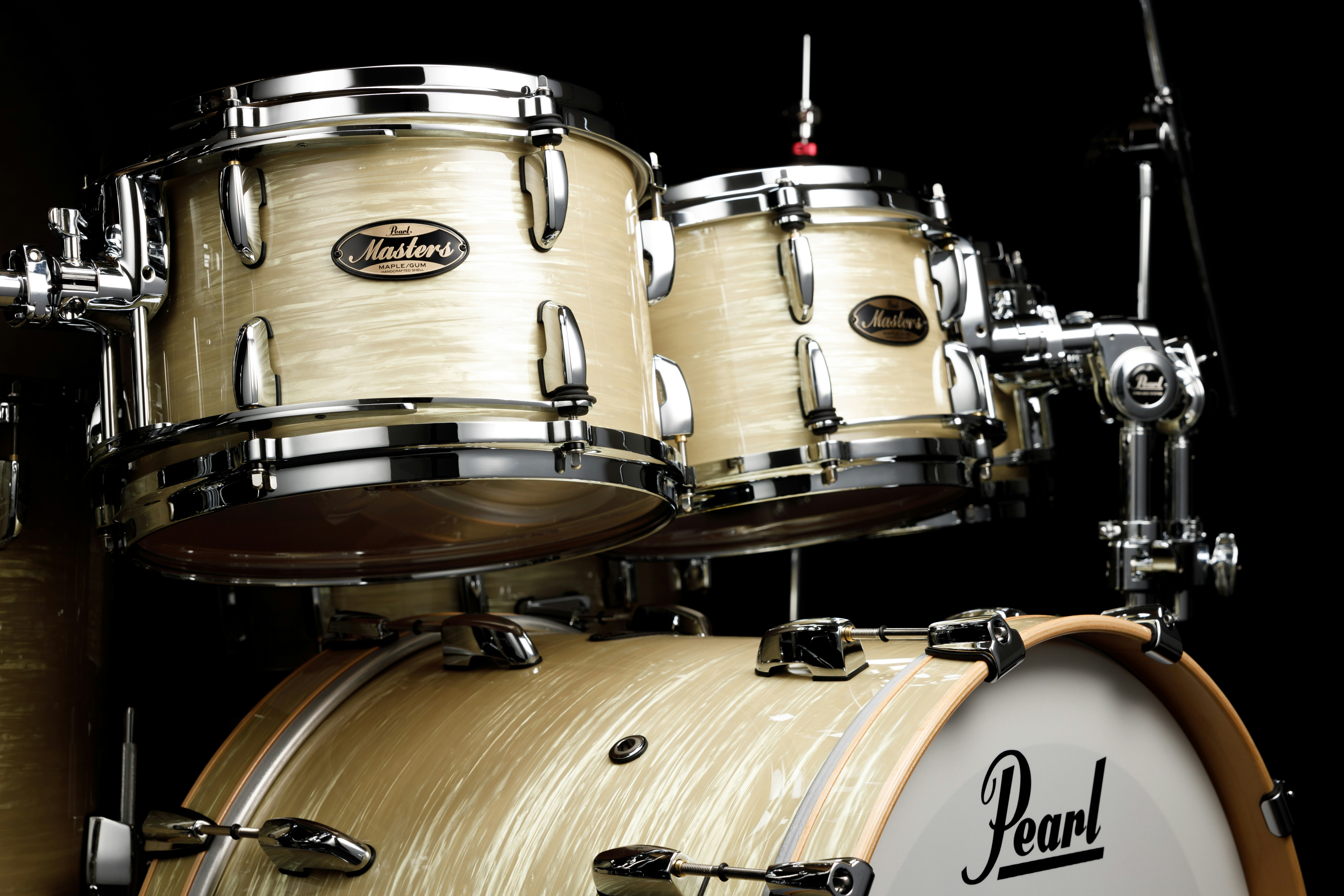A close up of a drum set on a black background photo – Free Drums Image ...