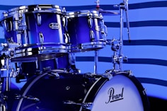 A close up of a blue drum set