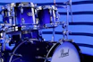 A close up of a blue drum set