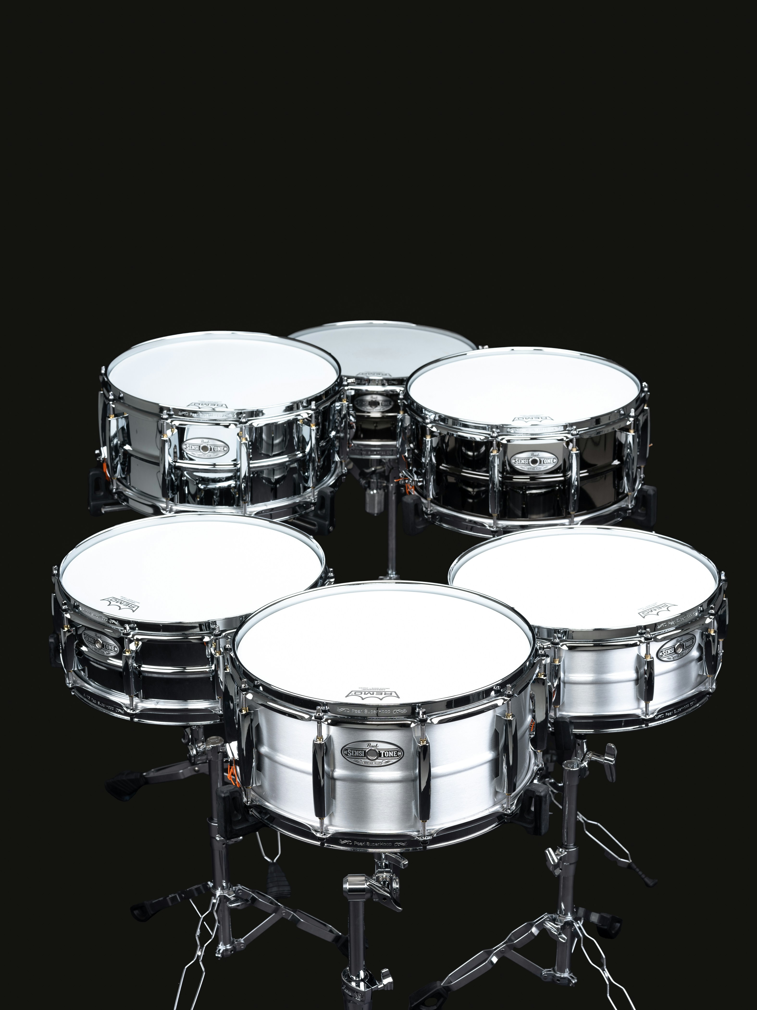 A set of drums on a black background photo – Free Snare drum Image on ...