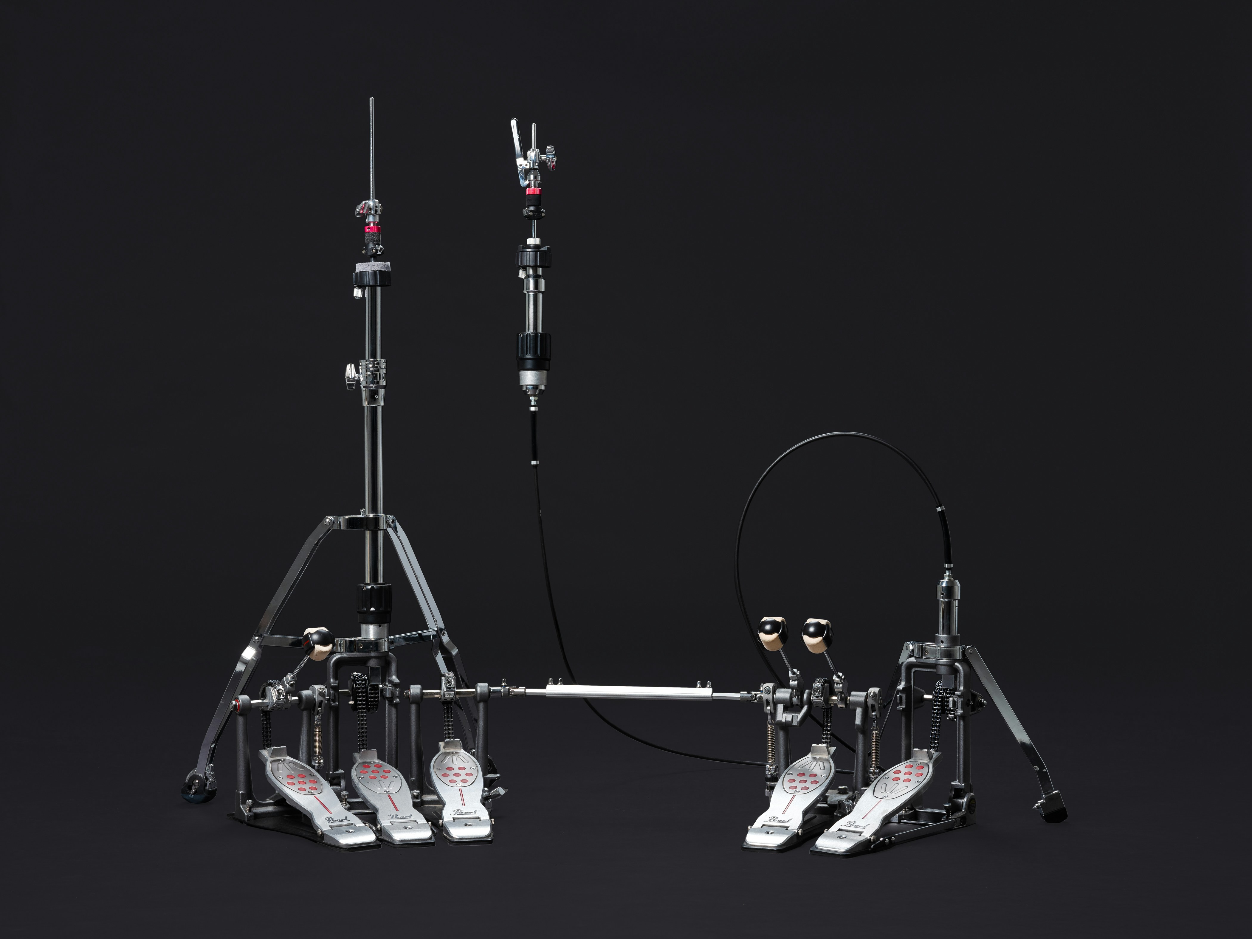 A black and white photo of a tripod, Eliminator Redline Family Pearl Drums Drum Hardware