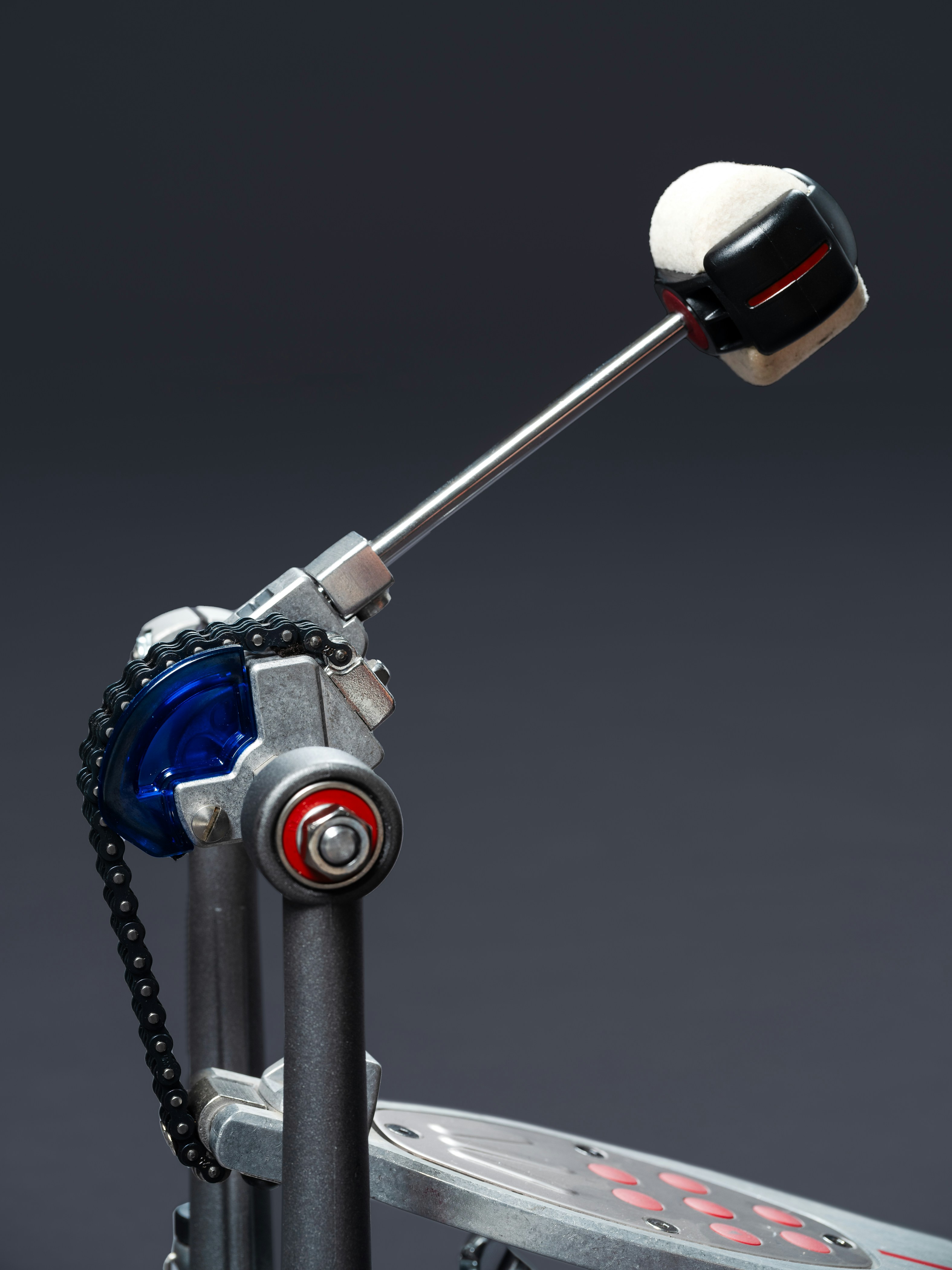 A close up of a scooter on a gray background