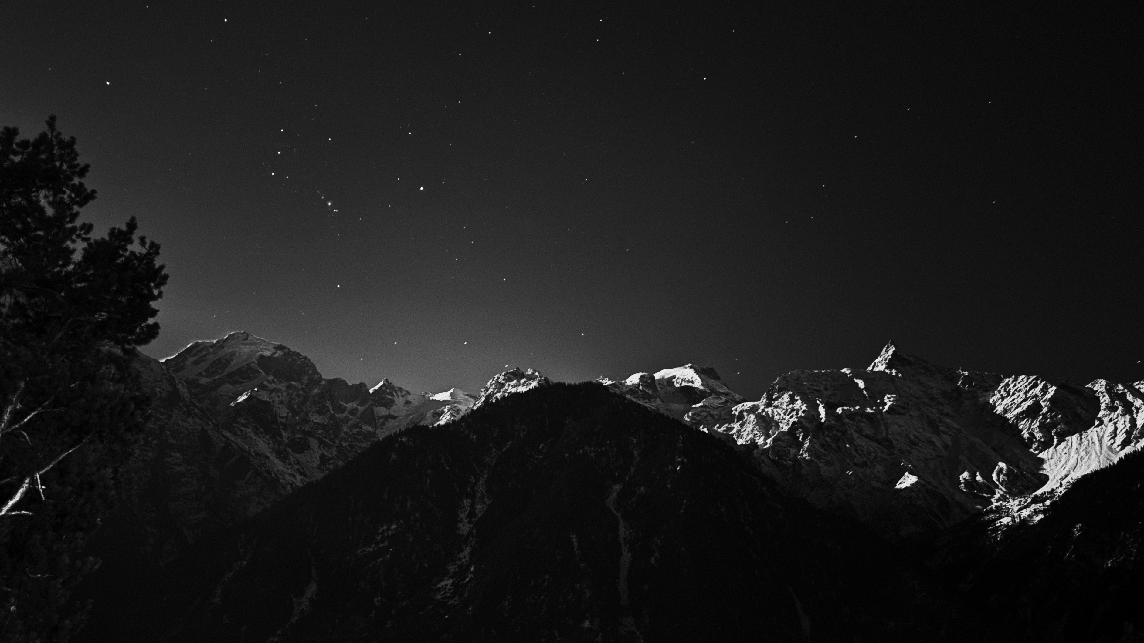A black and white photo of a mountain range