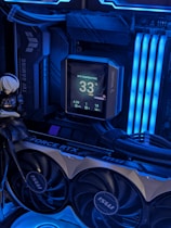 A close up of a computer with a clock on it
