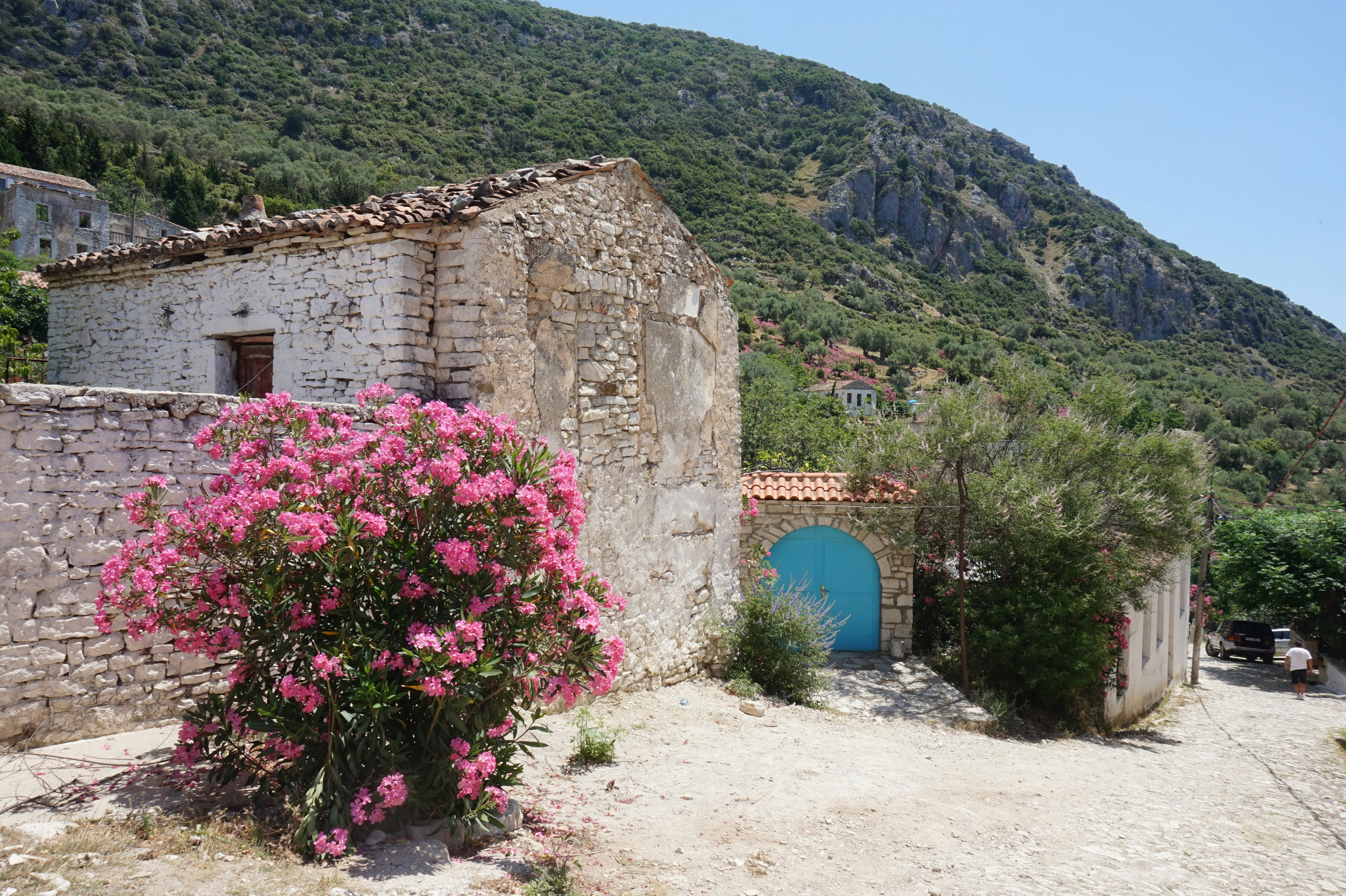 Dramatic cliffs and turquoise waters of the Albanian Riviera, an ideal spot for sun-seekers