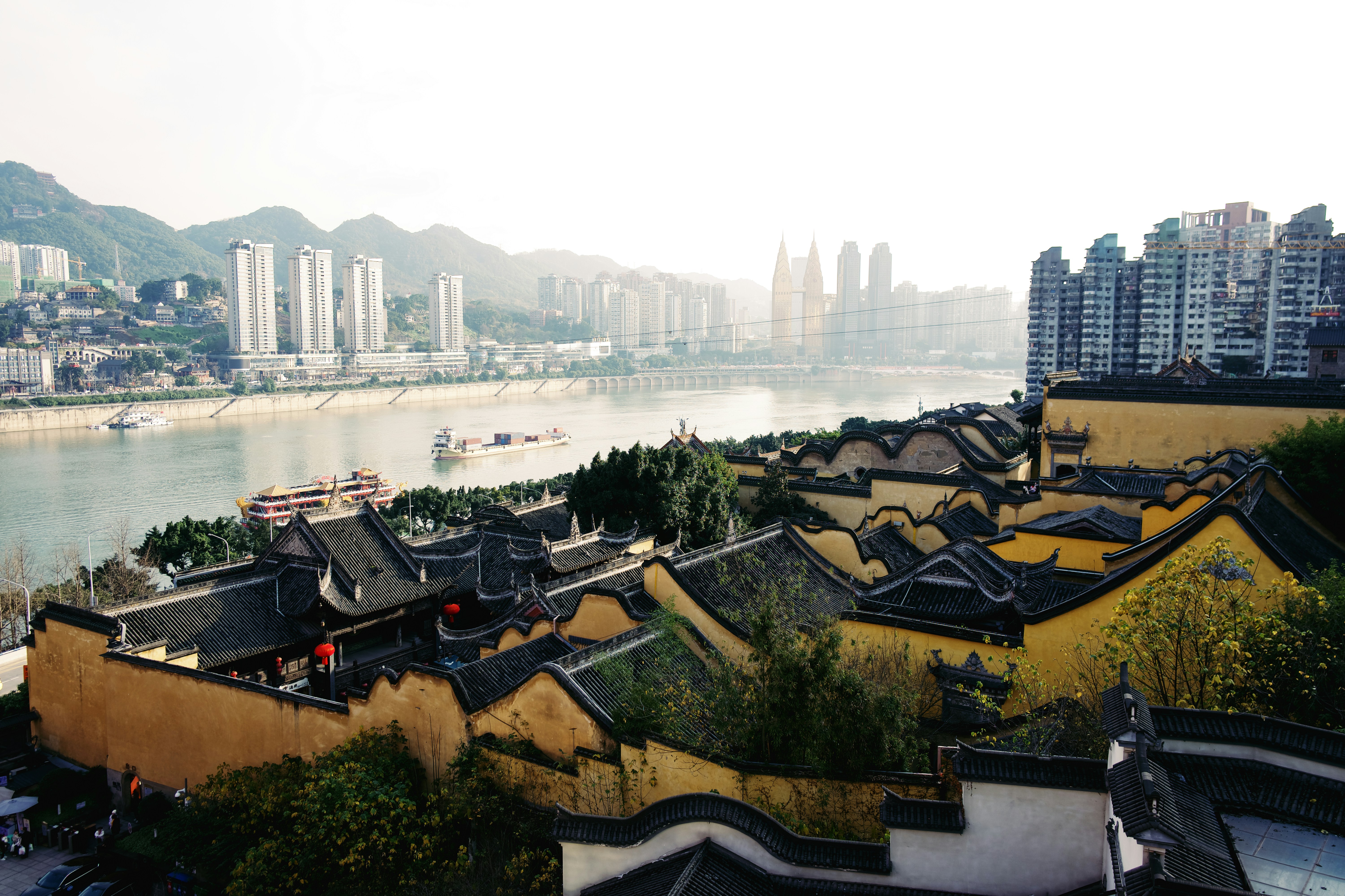 An aerial view of a city with a river running through it
