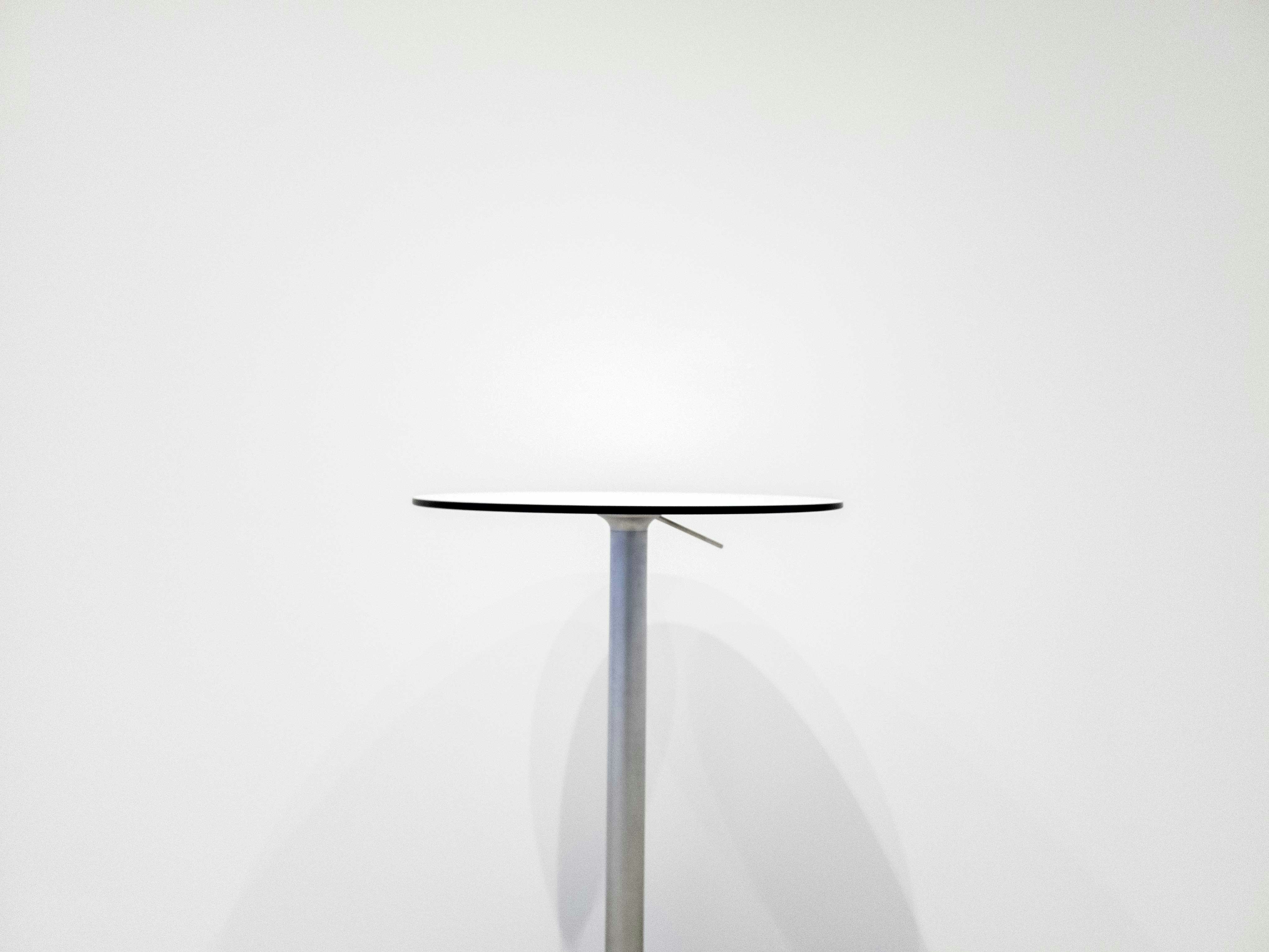 A table with a lamp on top of it