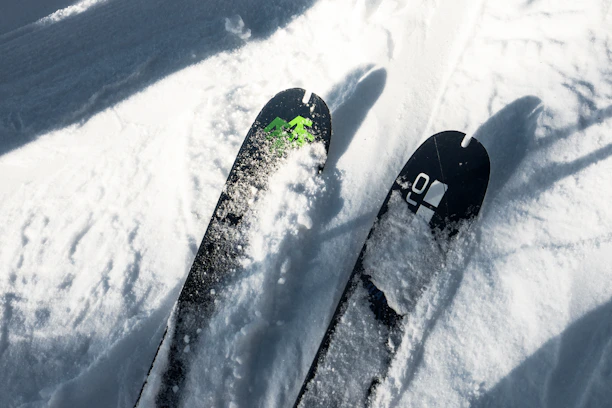 A pair of skis laying in the snow