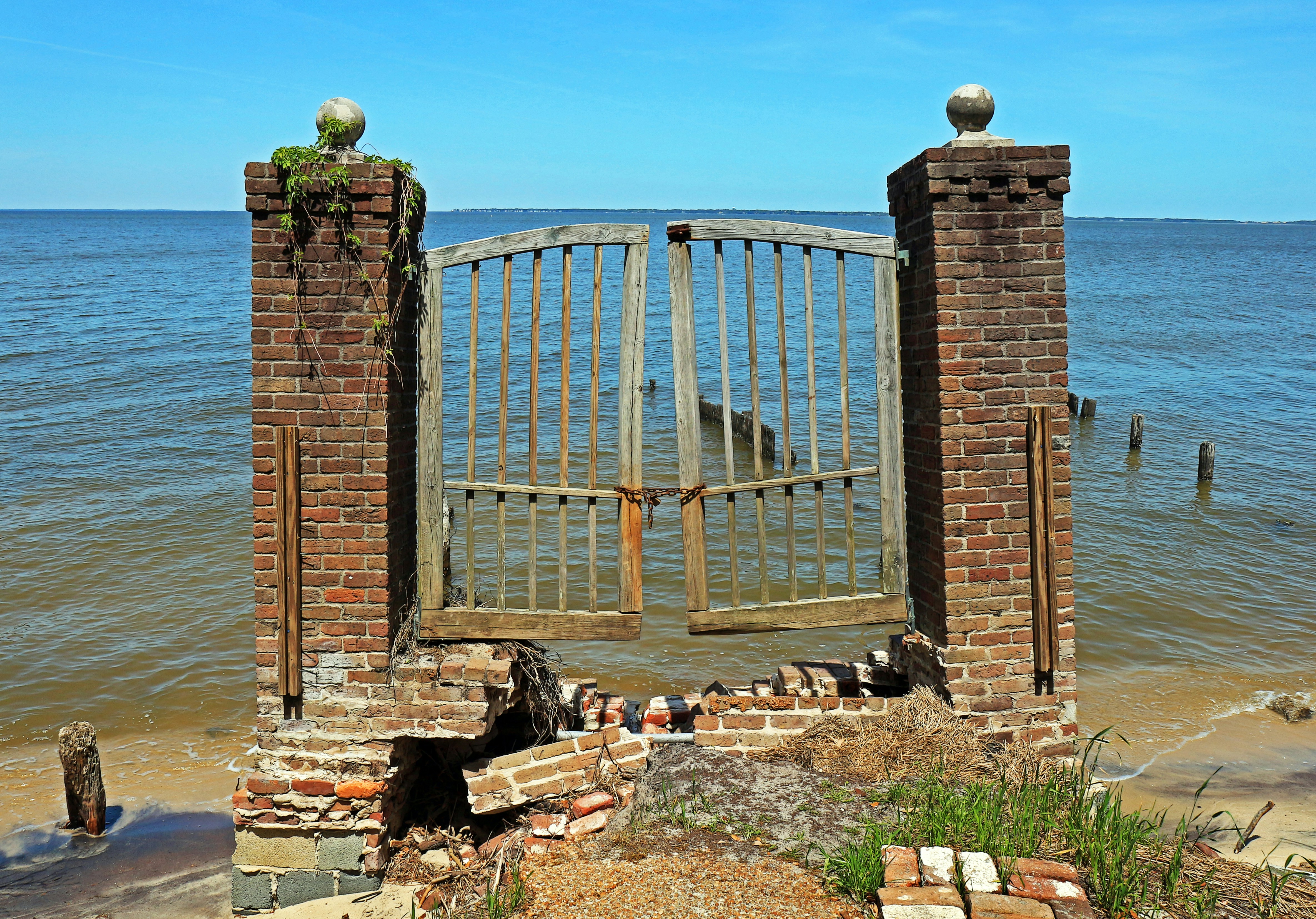 Gate to the sea in disrepair.