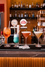 A bar with a variety of drinks on it