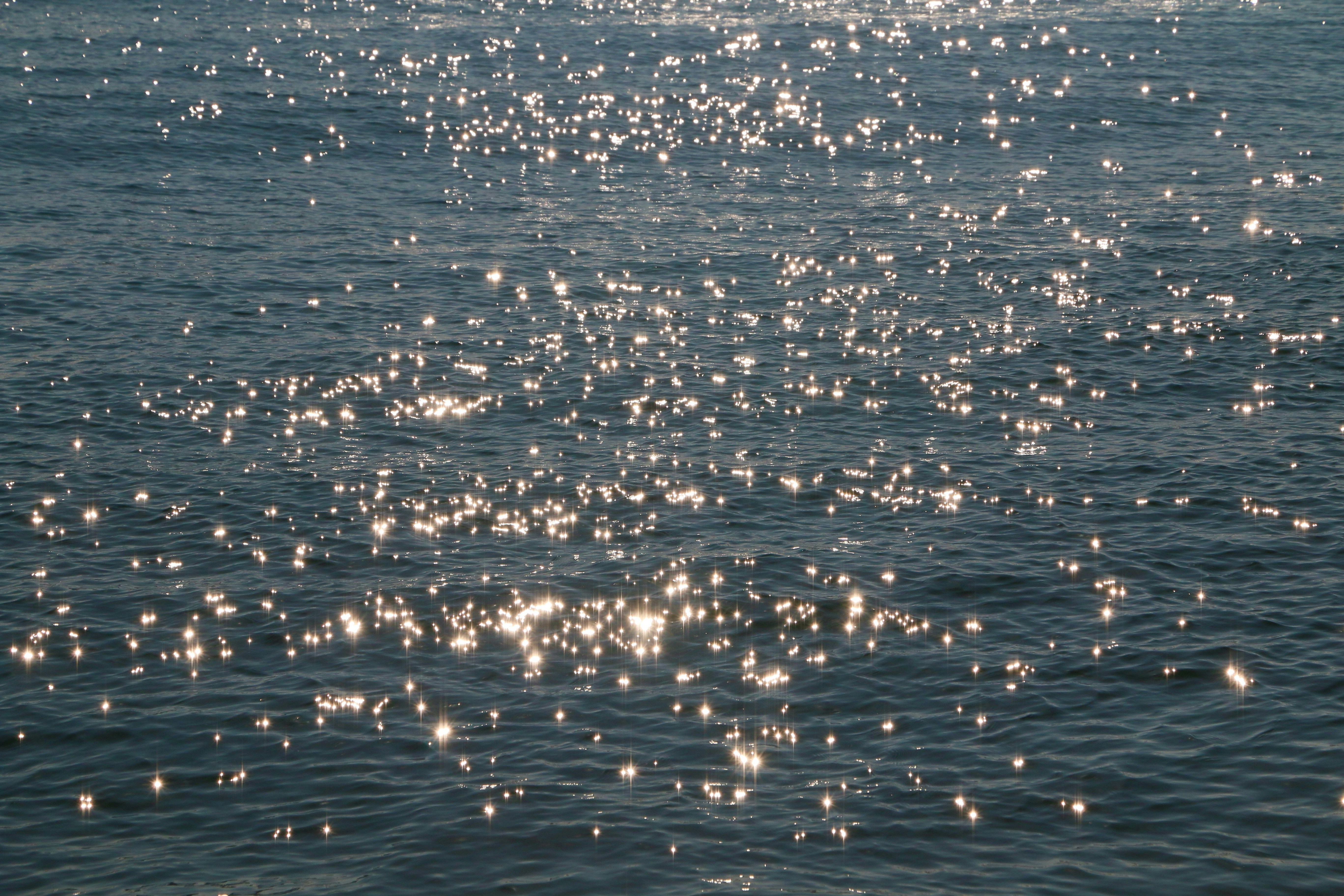 A body of water with a boat in the distance