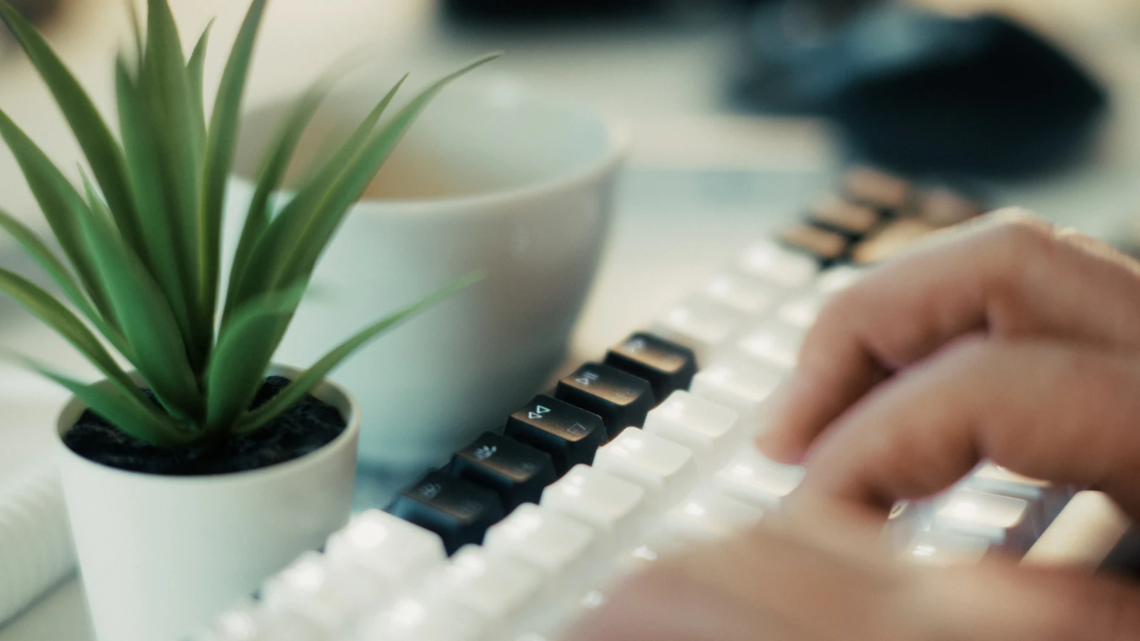 A clean, bright keyboard and workspace detail