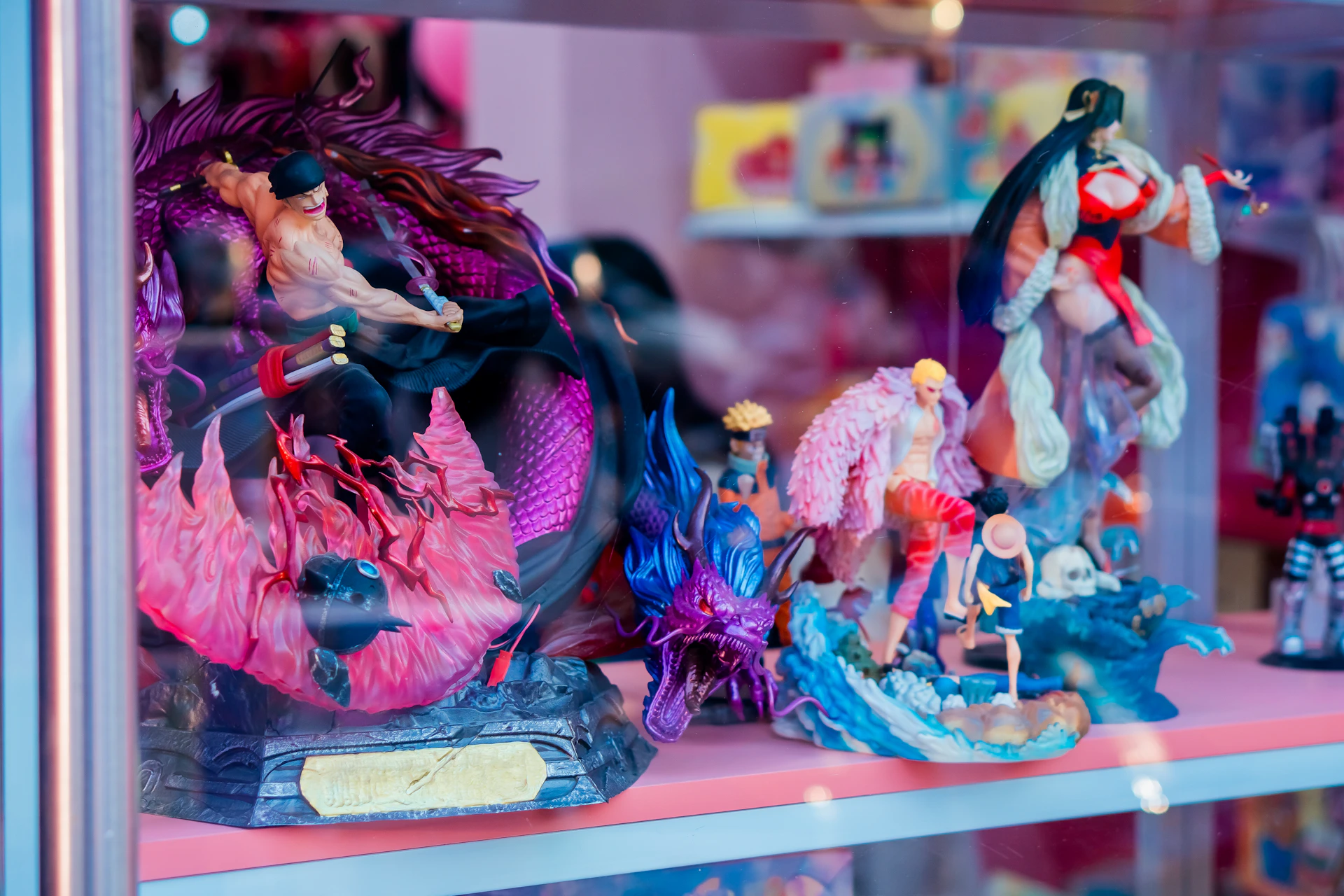 A display case filled with different types of figurines