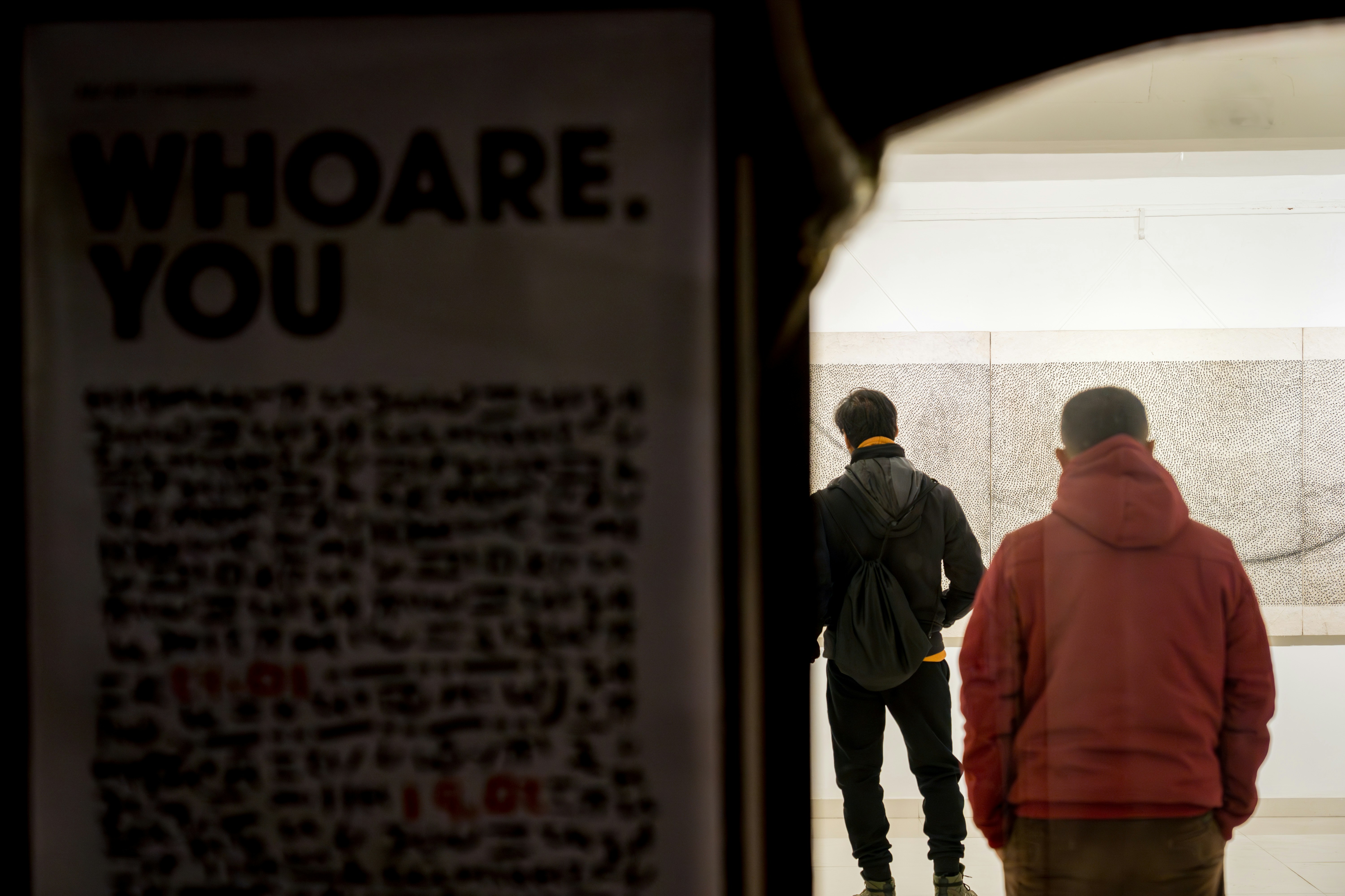 A group of people standing in a room