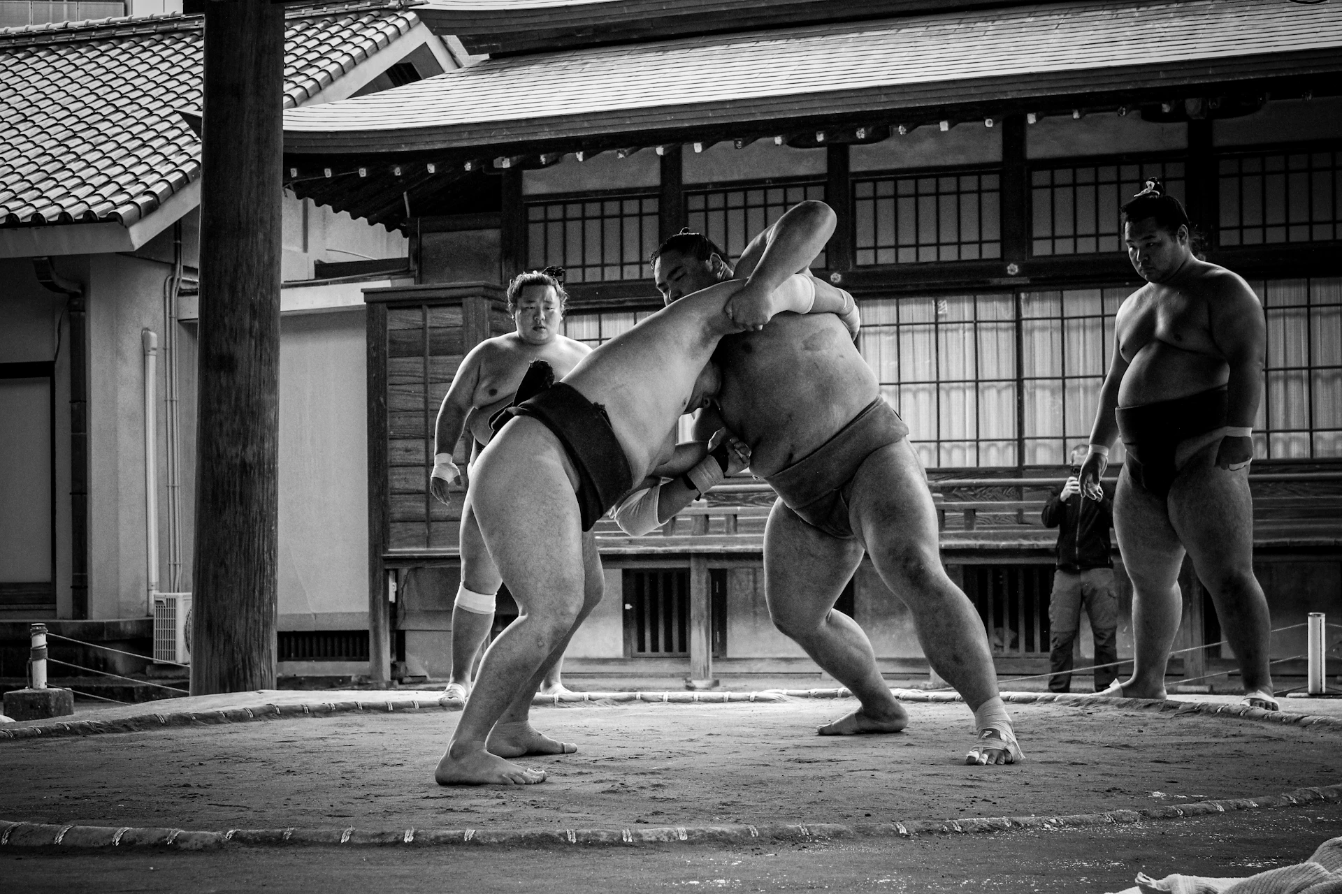 A couple of people that are standing in the street