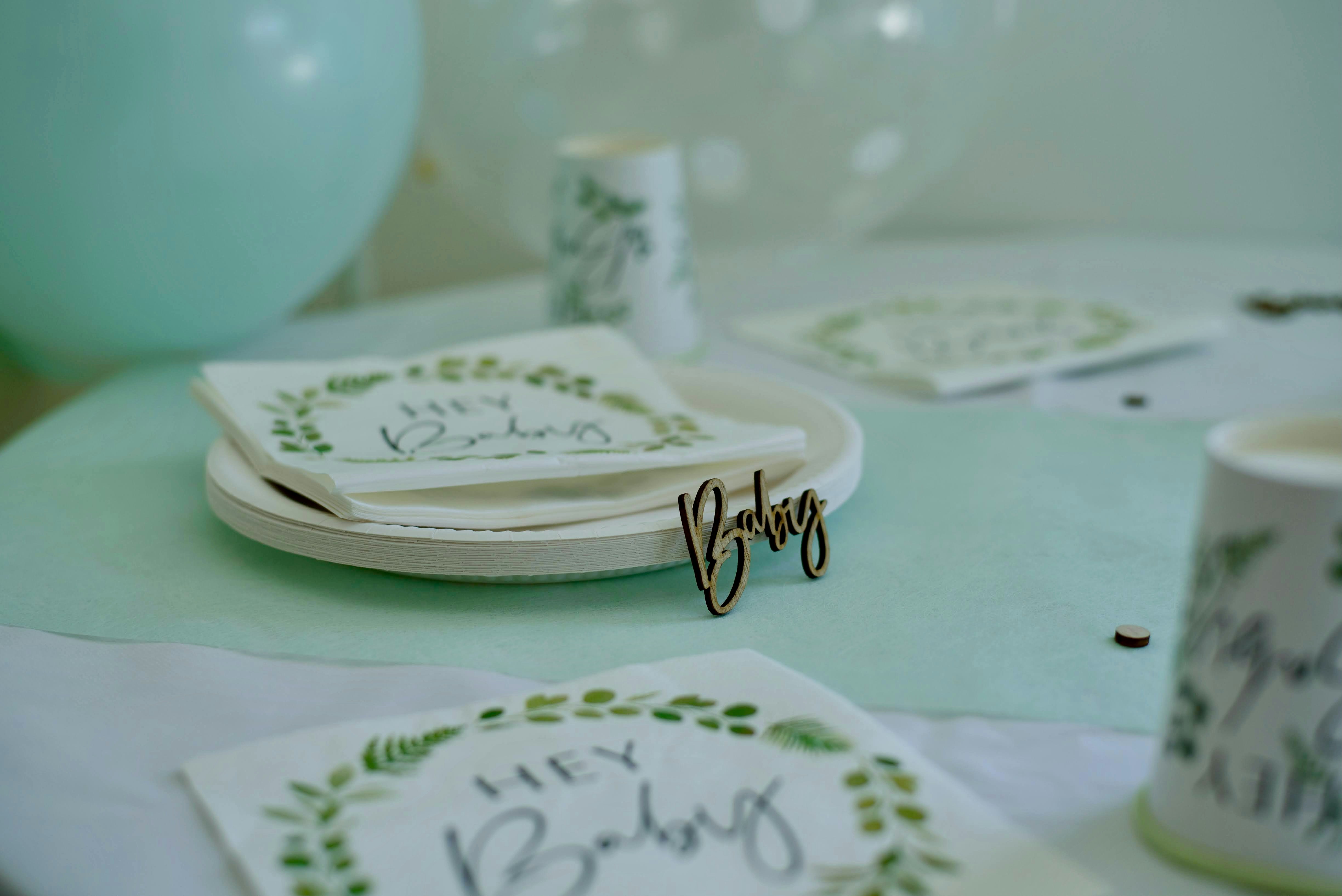 A close up of a table with plates and napkins