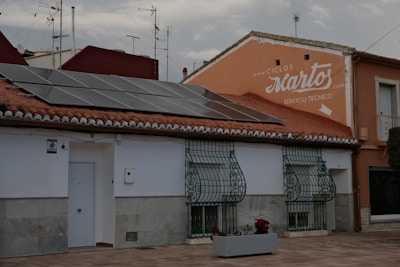 A building with a solar panel on the roof
