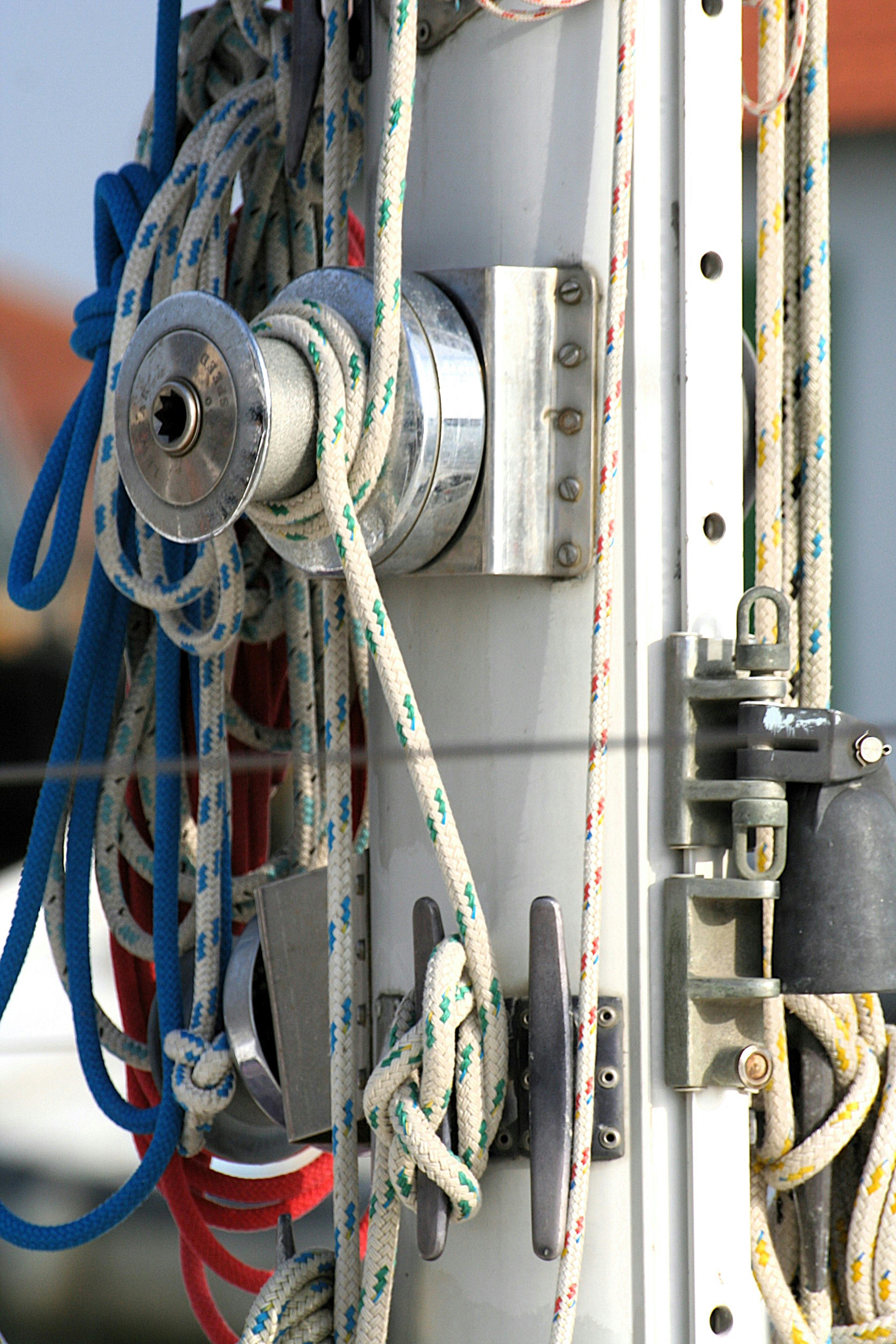 A close up of a bunch of ropes on a boat