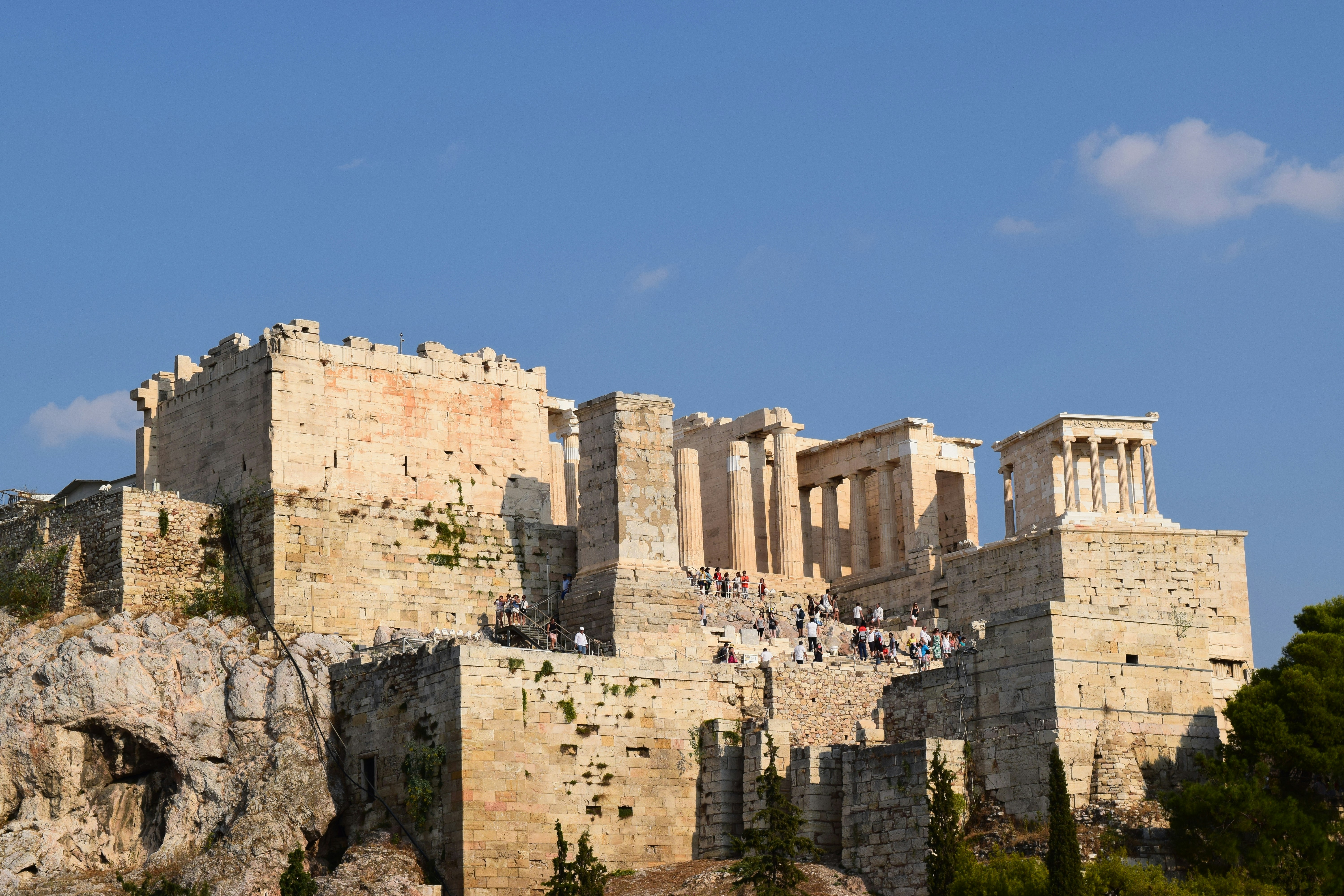 A large stone building sitting on top of a hill
