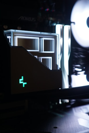 A close up of a computer screen with a skull on it