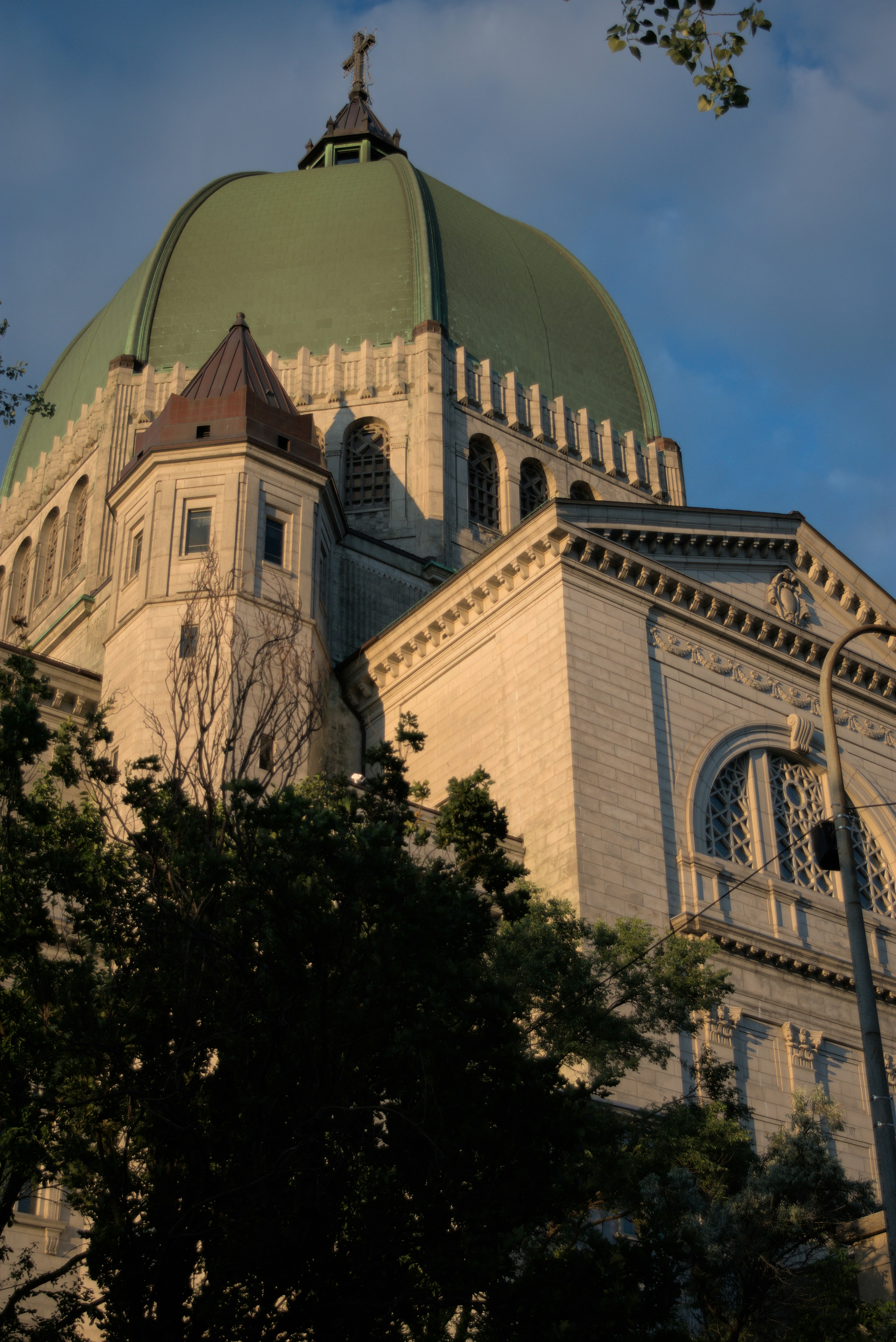A large building with a green dome on top