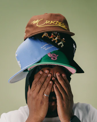 A man covering his face with his hands