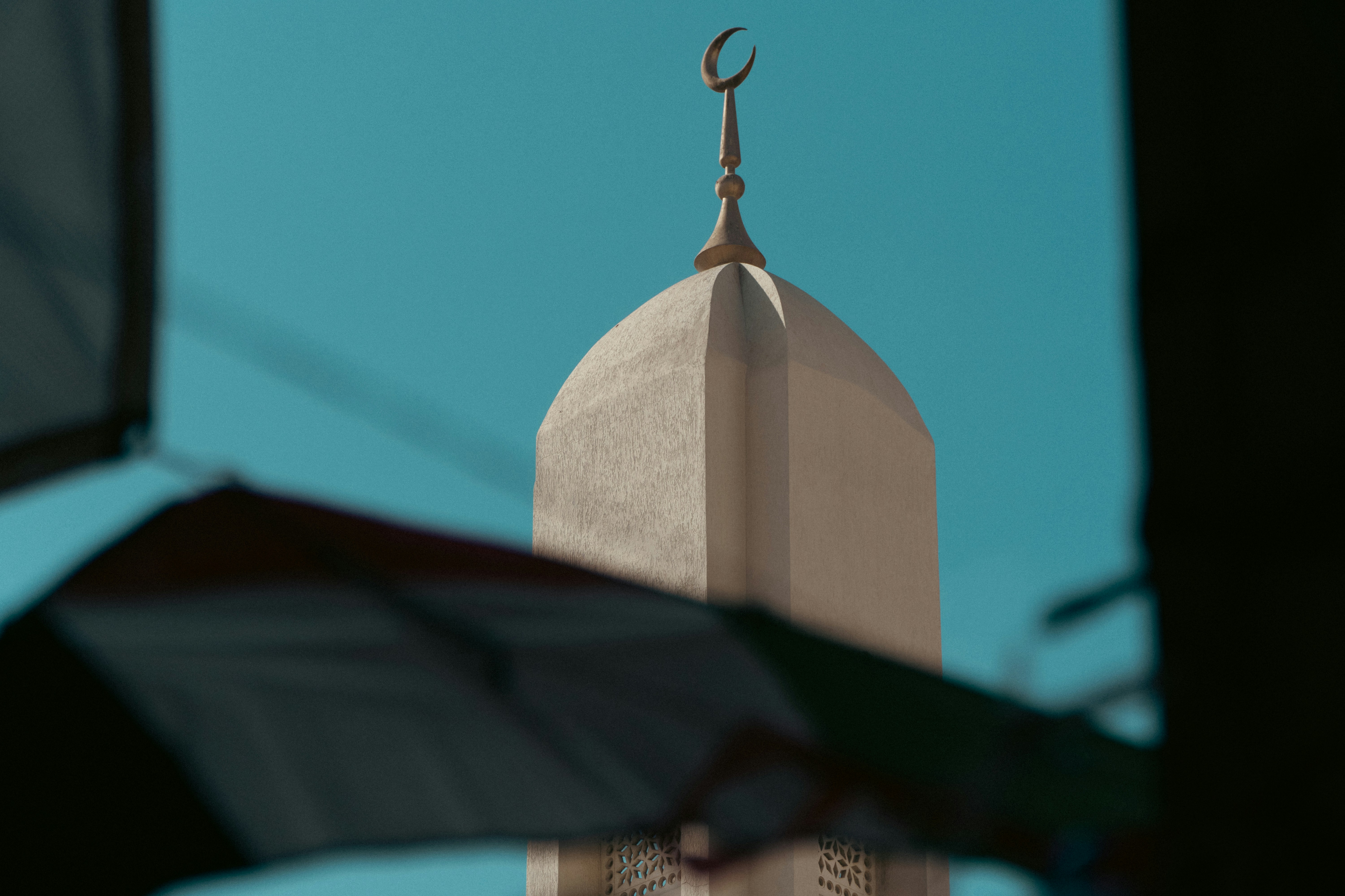 A tall building with a clock on it's side