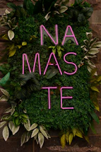 A sign that says namaste
