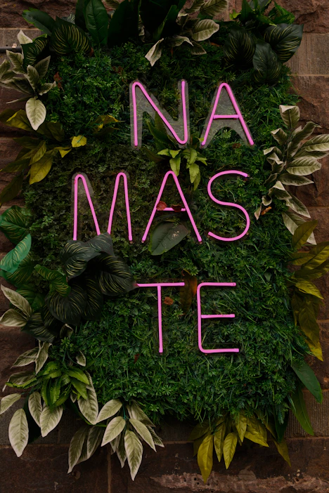 A sign that says namaste