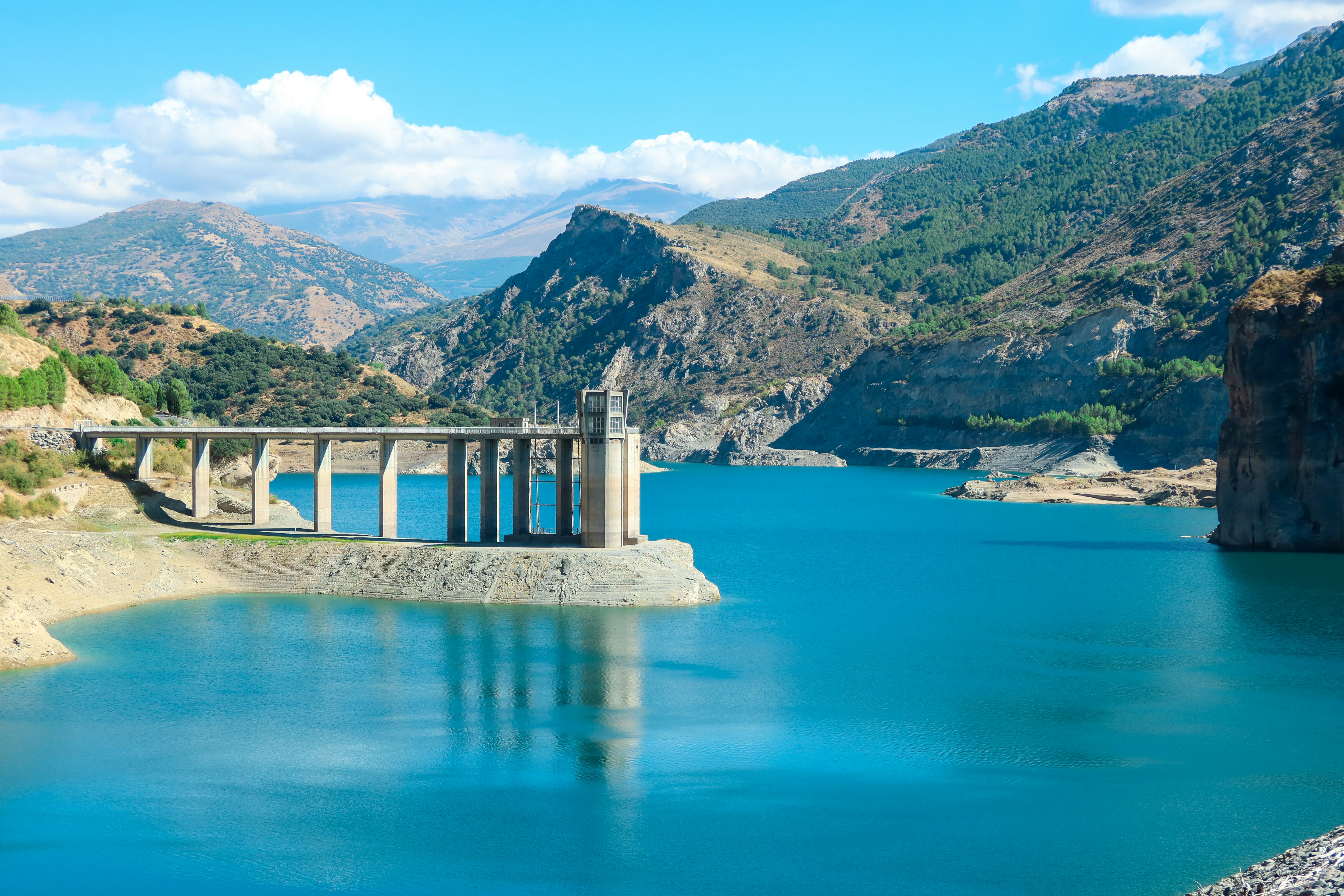 A large body of water surrounded by mountains