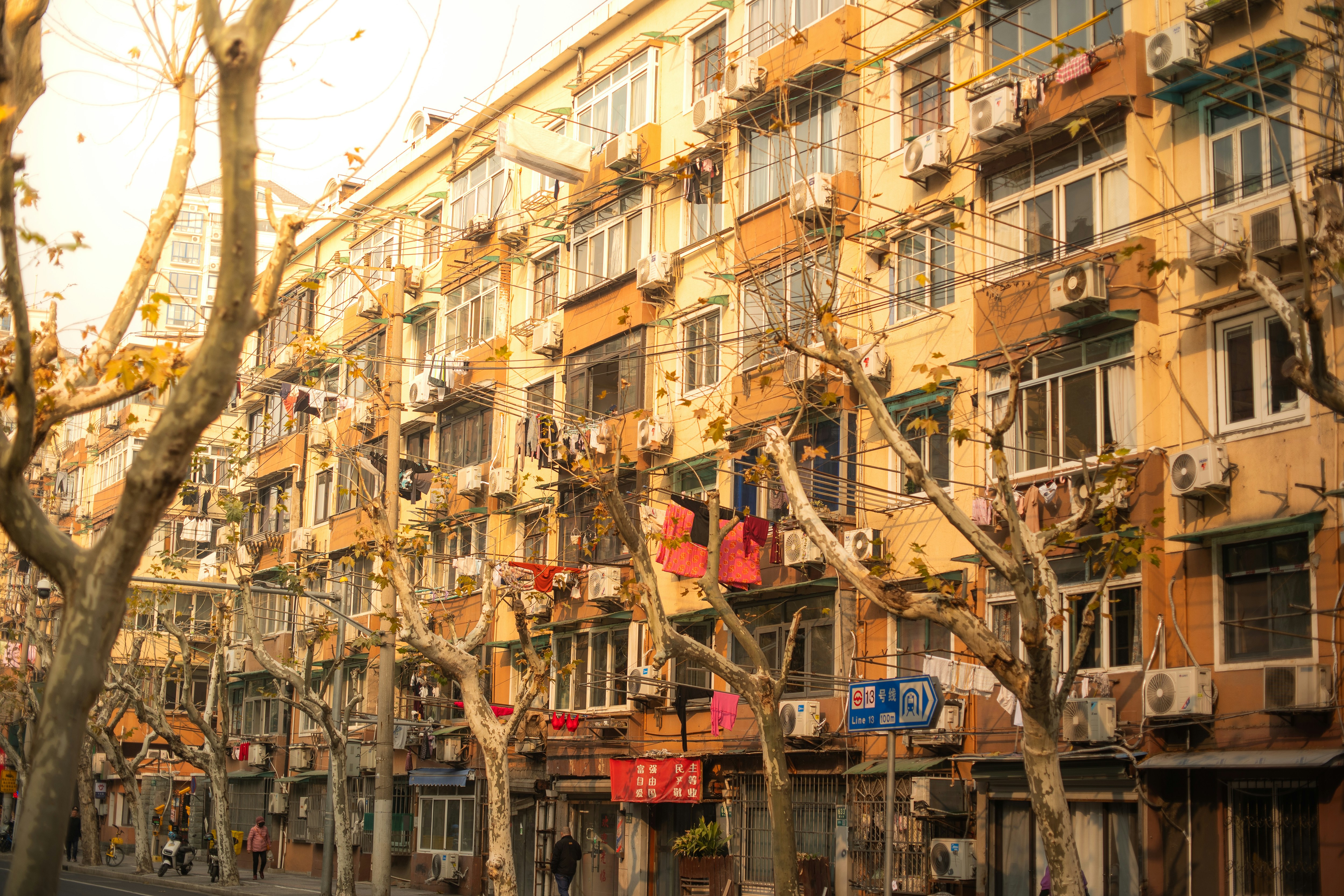 A city street lined with lots of tall buildings