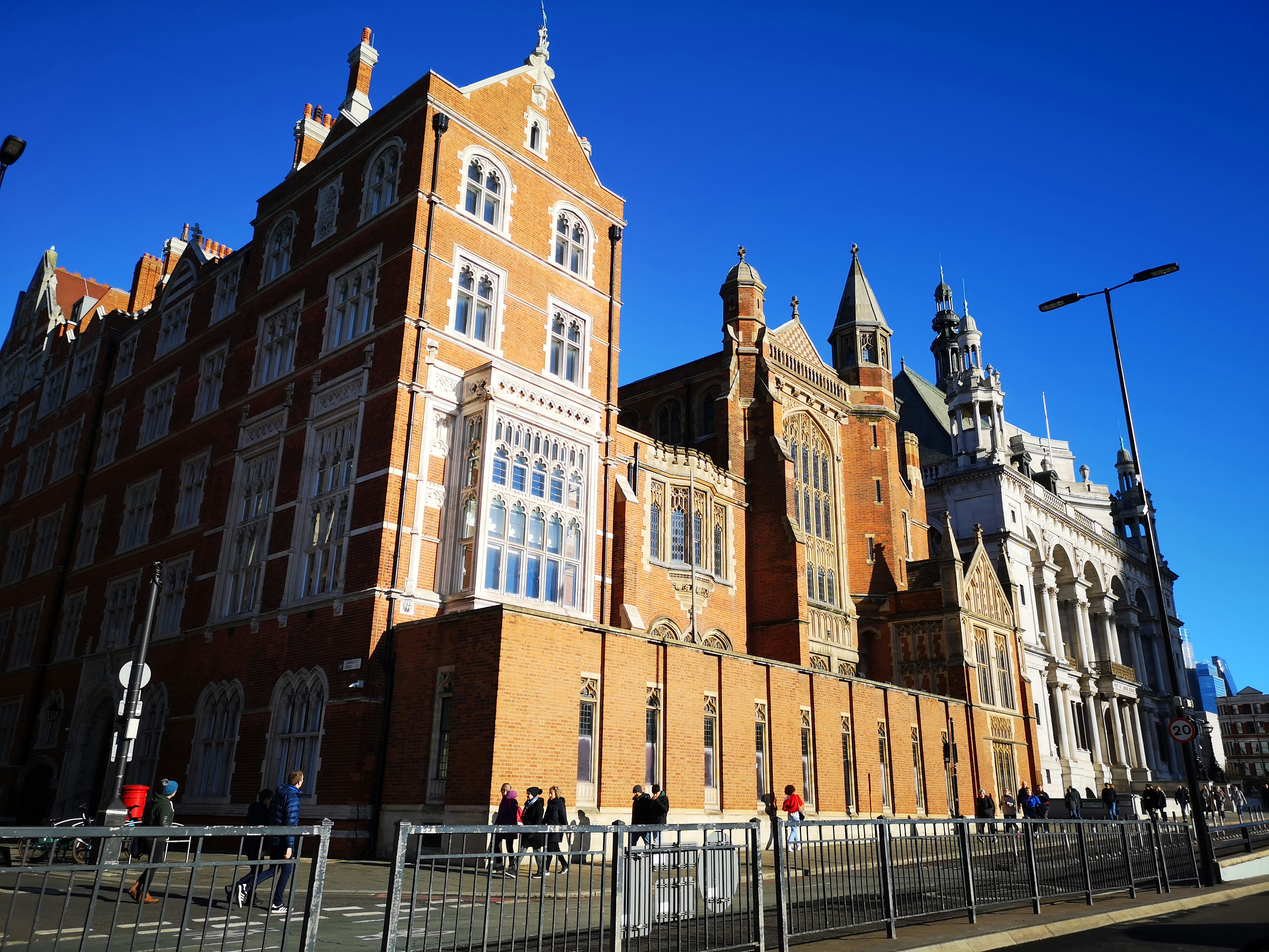 A large building with a fence around it
