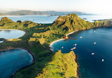 A large body of water surrounded by mountains