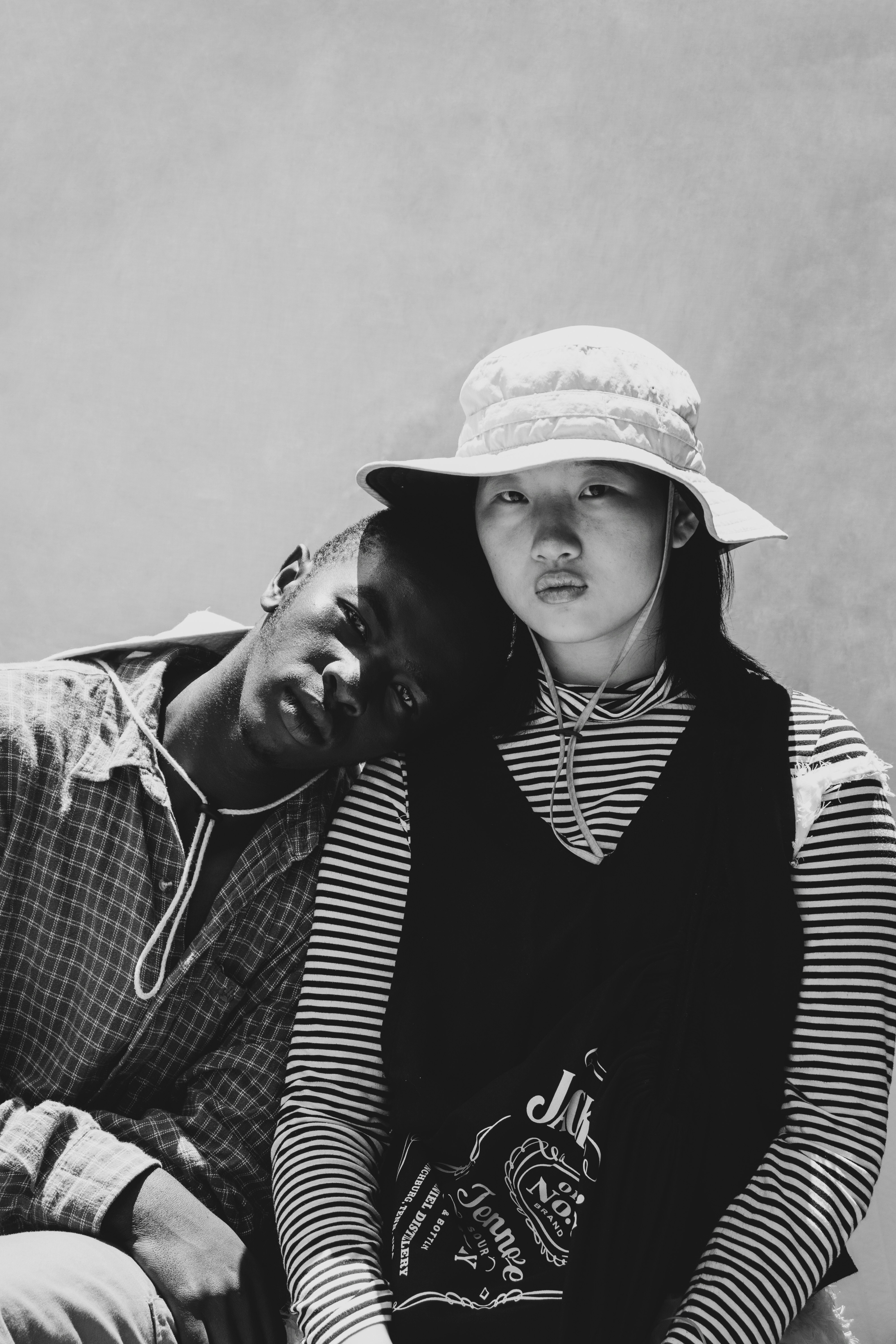 A black and white photo of a man and a woman