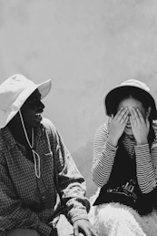 A man and a woman sitting next to each other