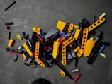 A pile of construction tools sitting on top of a floor