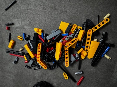 A pile of construction tools sitting on top of a floor