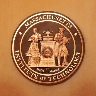 The massachusetts state seal on the wall of a building