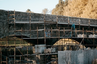 A bridge with scaffolding on the side of it