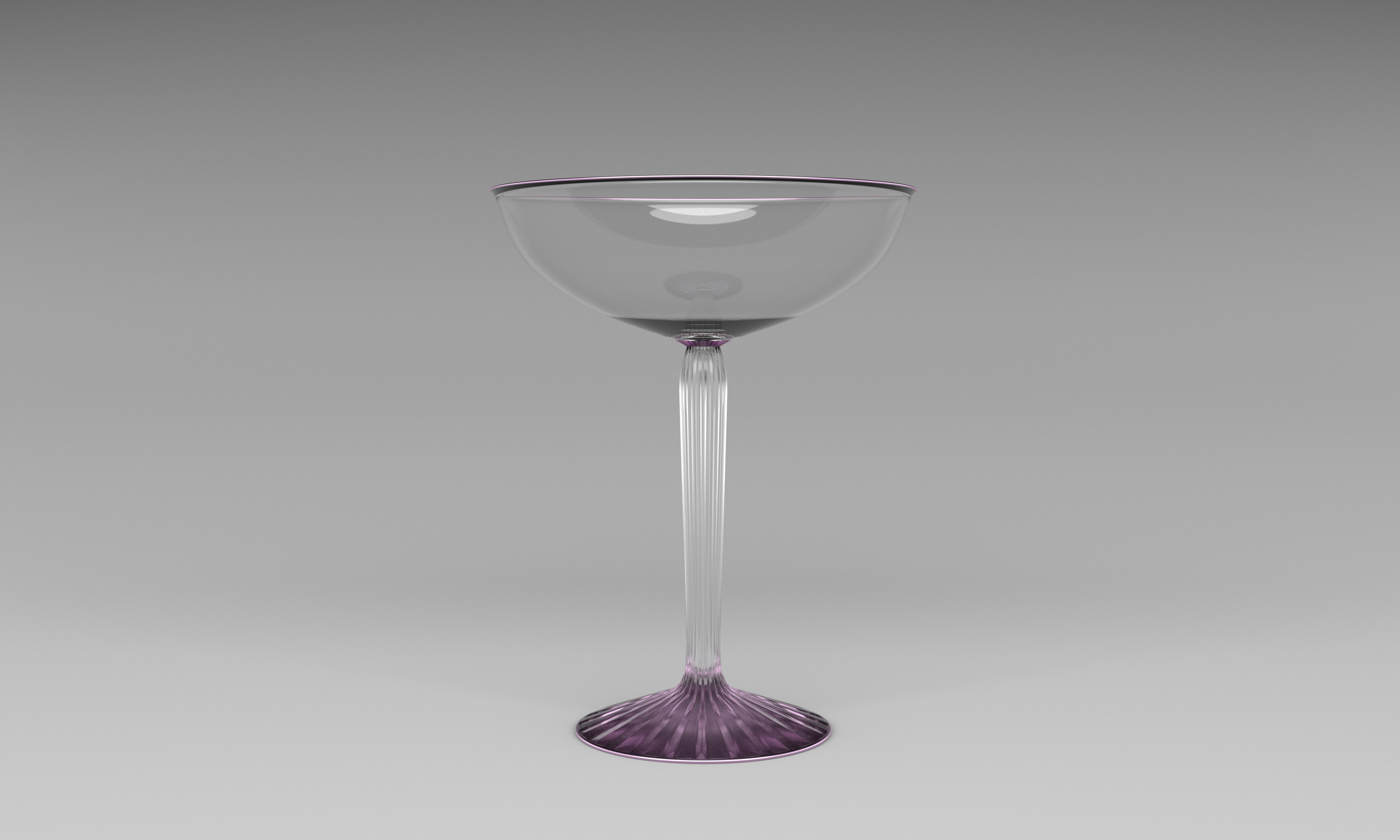 A purple wine glass sitting on top of a table