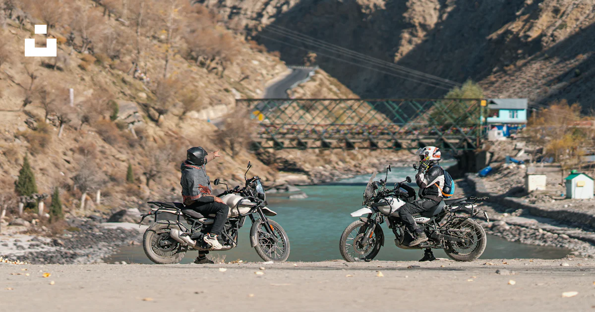 A group of motorcycles parked next to a river photo – Free India Image ...