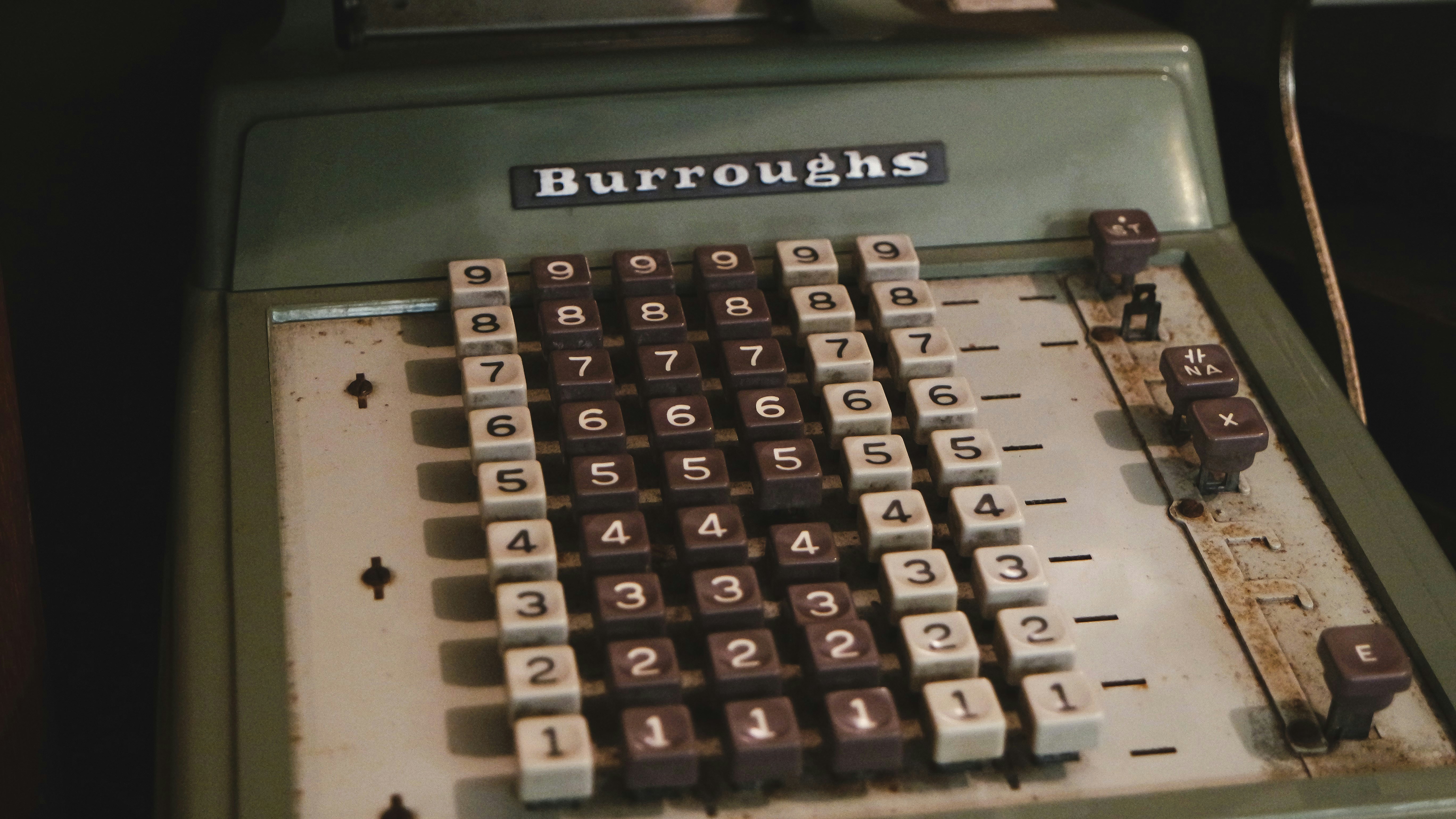 An old typewriter sitting on top of a table