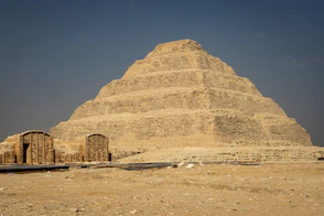 A large pyramid in the middle of a desert