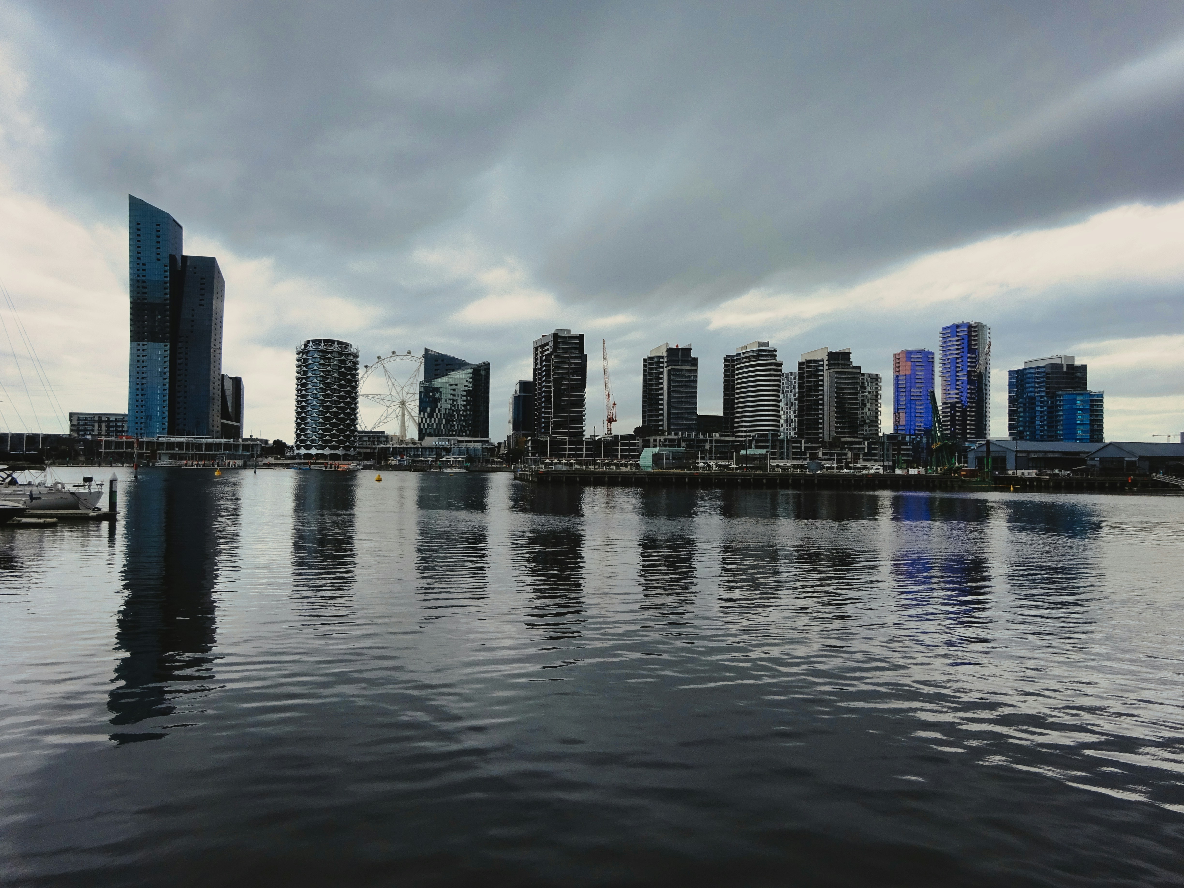 A large body of water with a city in the background