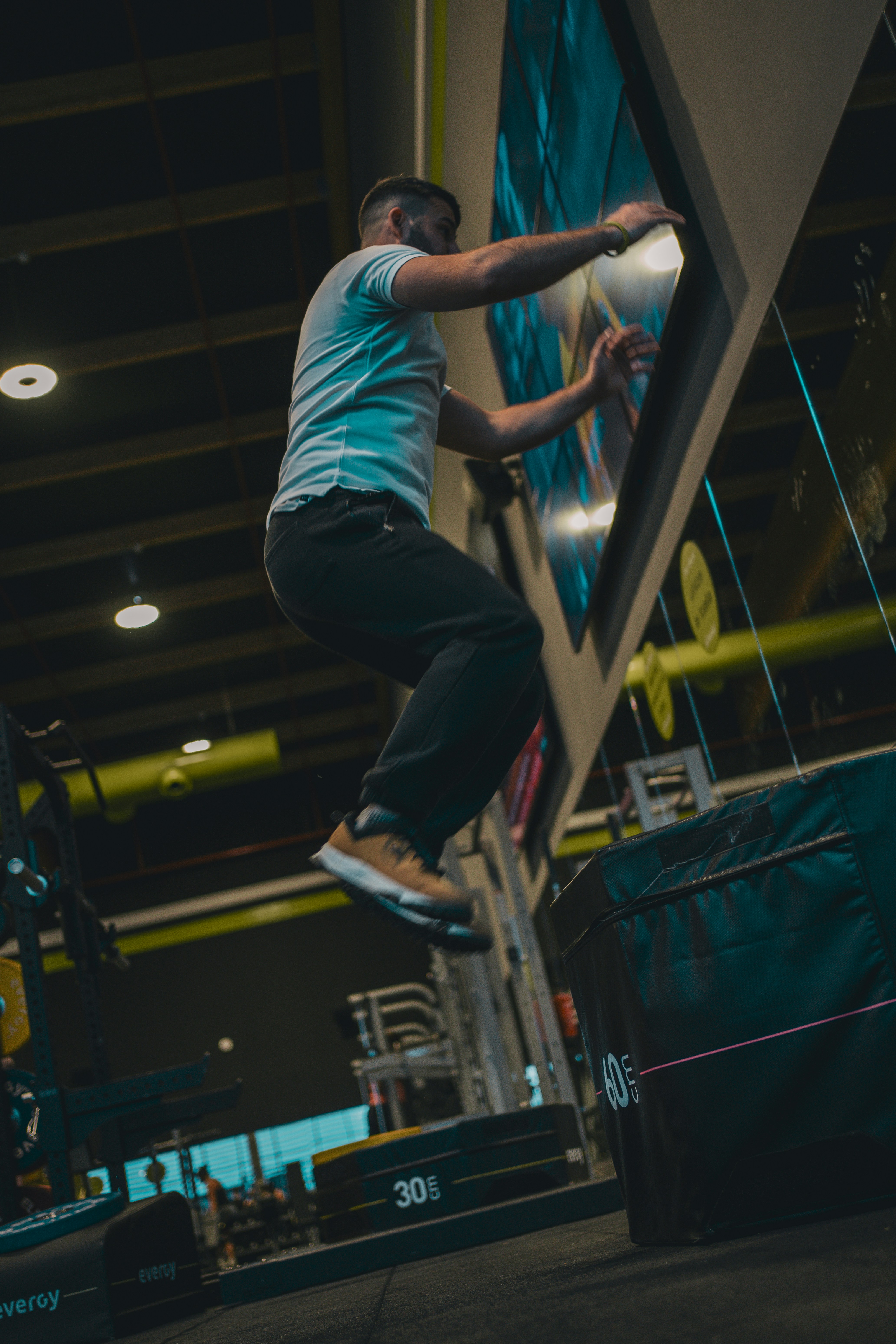 A man is doing a trick on a skateboard
